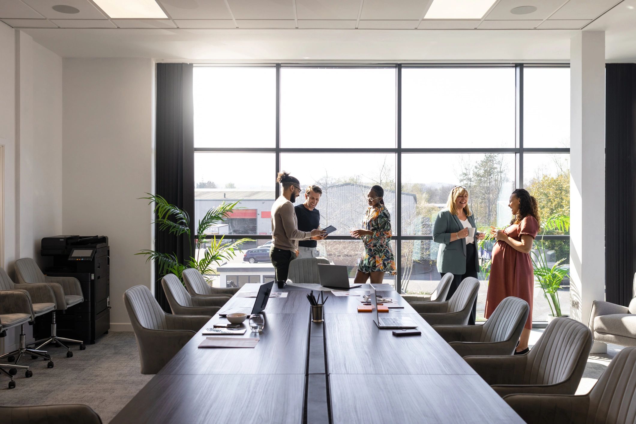 Business professionals meeting to discuss sponsorship strategy